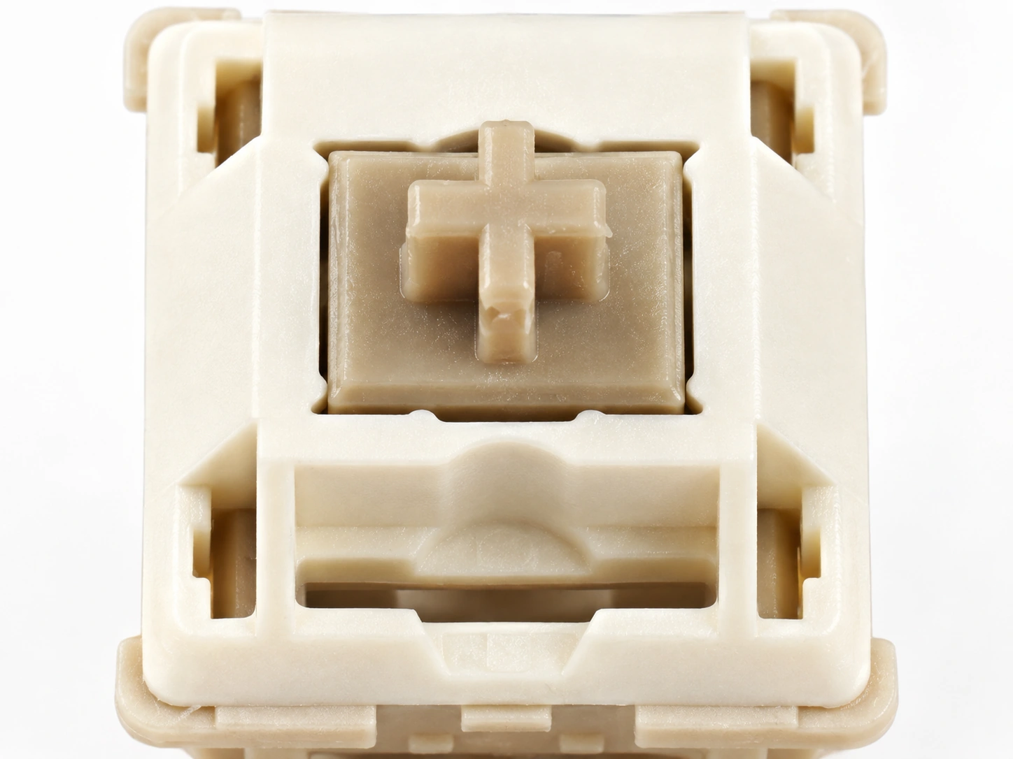 Close-up of a beige Xuhua Doll stem and cream top housing