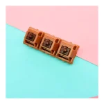 Golden Brown CAP V2 switches in three orientations; display quantity only; 5-pin version shown
