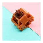 Golden Brown CAP V2 switch, angled view; product only; 5-pin version shown