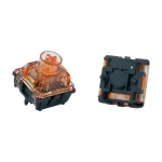 Gateron Magnetic Spark Orange switch, upper housing and underside views