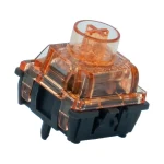 Gateron Magnetic Spark Orange Hall Effect switch, front three-quarter view