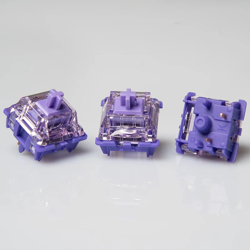 Gateron Purple Jade front and bottom views showing two metal contacts and the central locating post