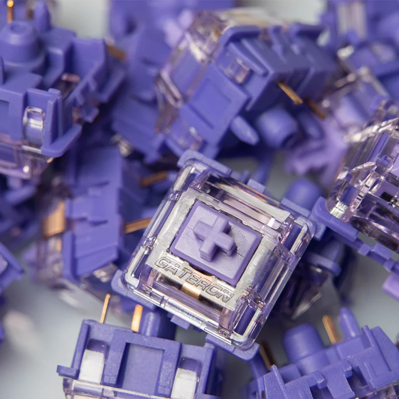 Gateron Purple Jade switch close-up showing the Gateron-marked upper housing