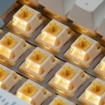 QVQ N2 Milk Dragon V2 switches installed on a mechanical keyboard with lighting.