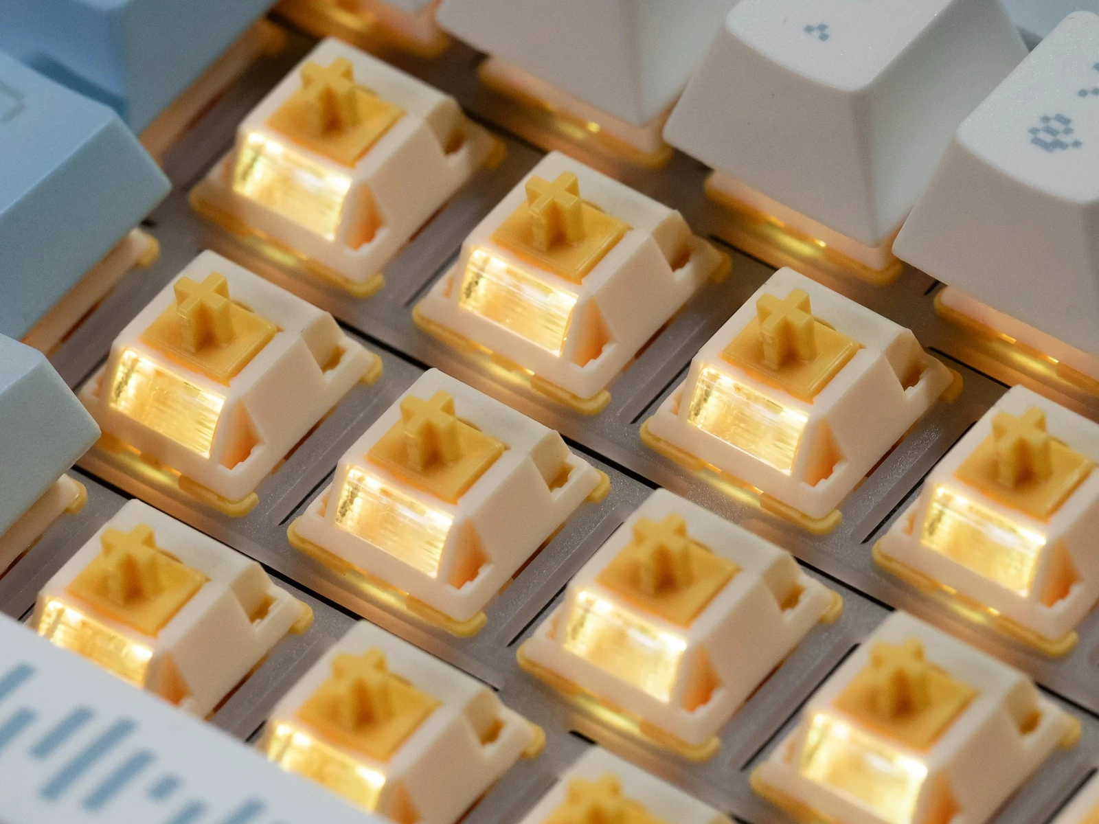 QVQ N2 Milk Dragon V2 switches installed on a mechanical keyboard with lighting.