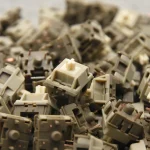 Macro view of multiple HMX Rain rail bottom-out linear switches