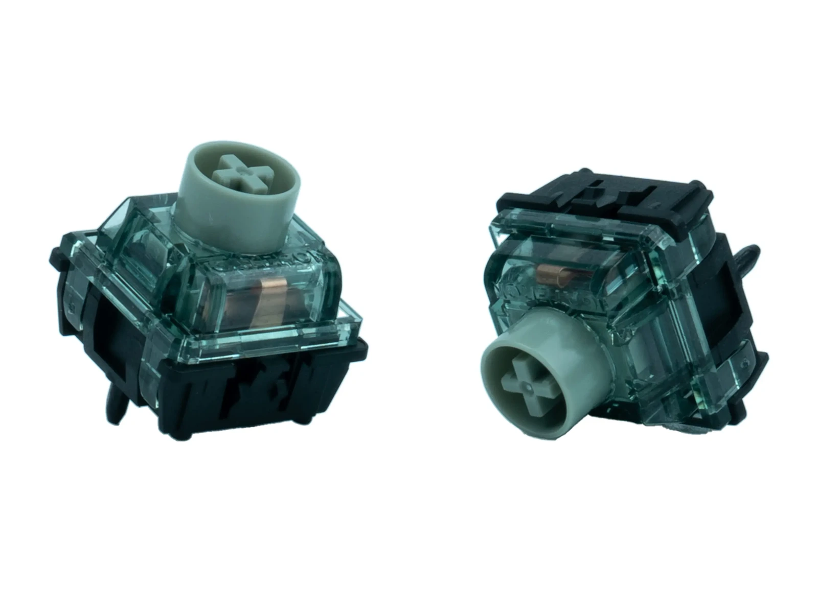 Manufacturer photograph of two Dragon Roar switches; opposite housing views