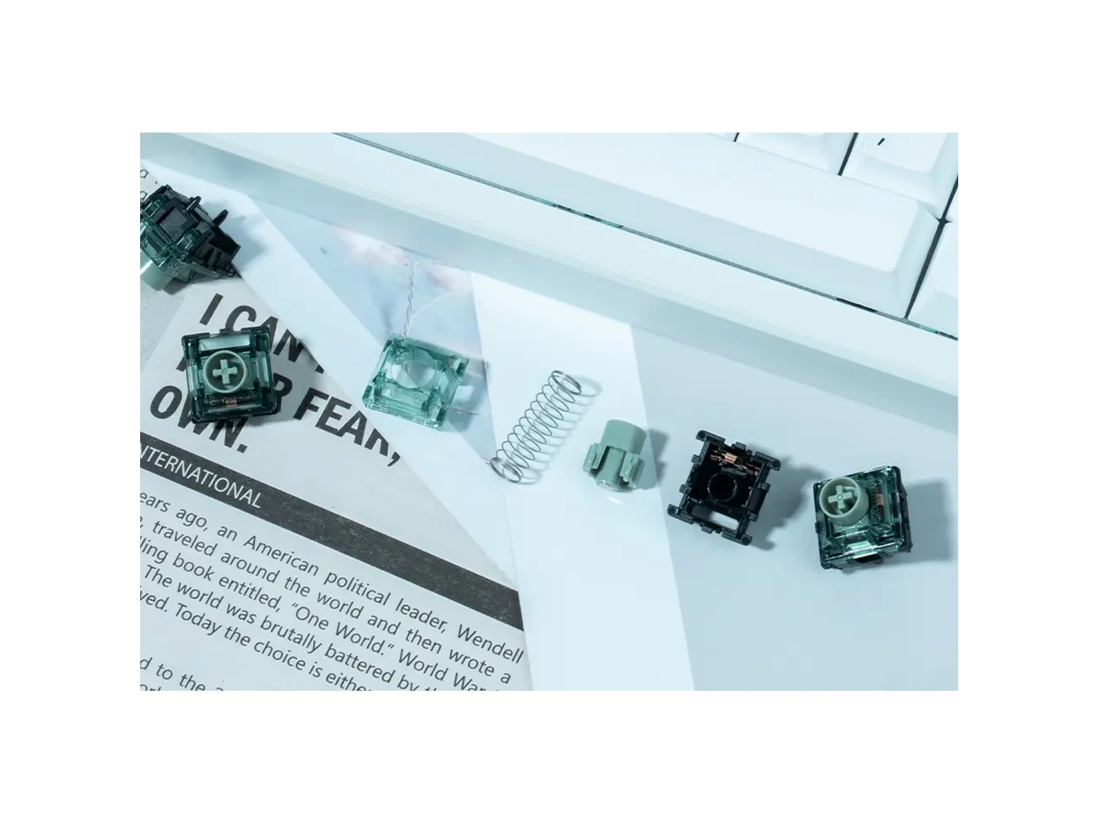 Manufacturer photograph of disassembled Dragon Roar parts beside a keyboard; no sound-test or universal compatibility claim